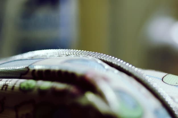 A close up shot of a Colombian peso bill, focusing on the details of the currency, set against a blurred background of economic data charts.