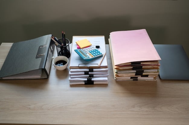 A well-organized workspace with documents neatly stacked, a pen resting on top, and a calculator nearby. The setting conveys a sense of preparedness and attention to detail.
