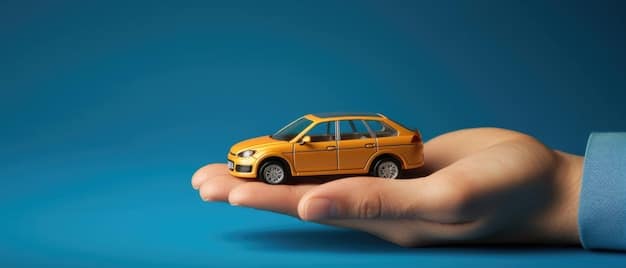 A close-up of a car key with a keychain that says 