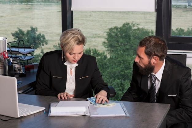 A financial advisor explaining the benefits of transferring severance payments to a pension fund to a client in an office setting.